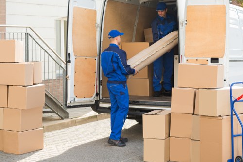 A man with a van service helping with a move in Camden