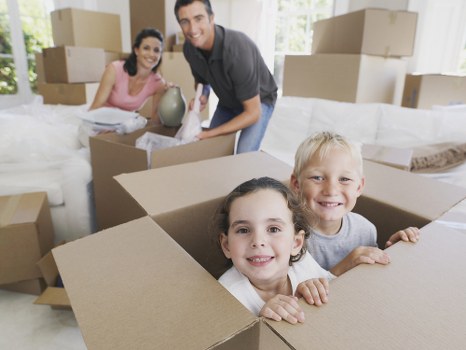 Office removal planning in Camden with packed boxes and workstations
