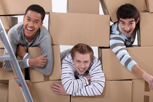 Packed moving boxes ready for removals in Camden