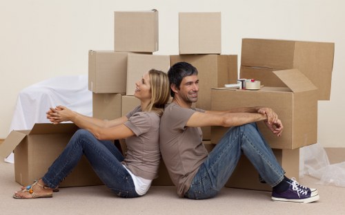 Loading household items into a van for a Camden move