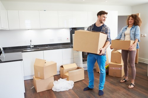 Furniture being loaded into a moving truck in Camden
