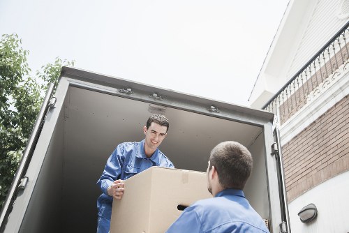Local Camden moving service handling packed boxes and furniture