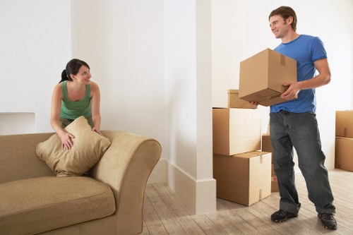 Professional packers organising belongings in Camden